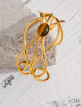 a. Armband- Charming- Brown Eye
